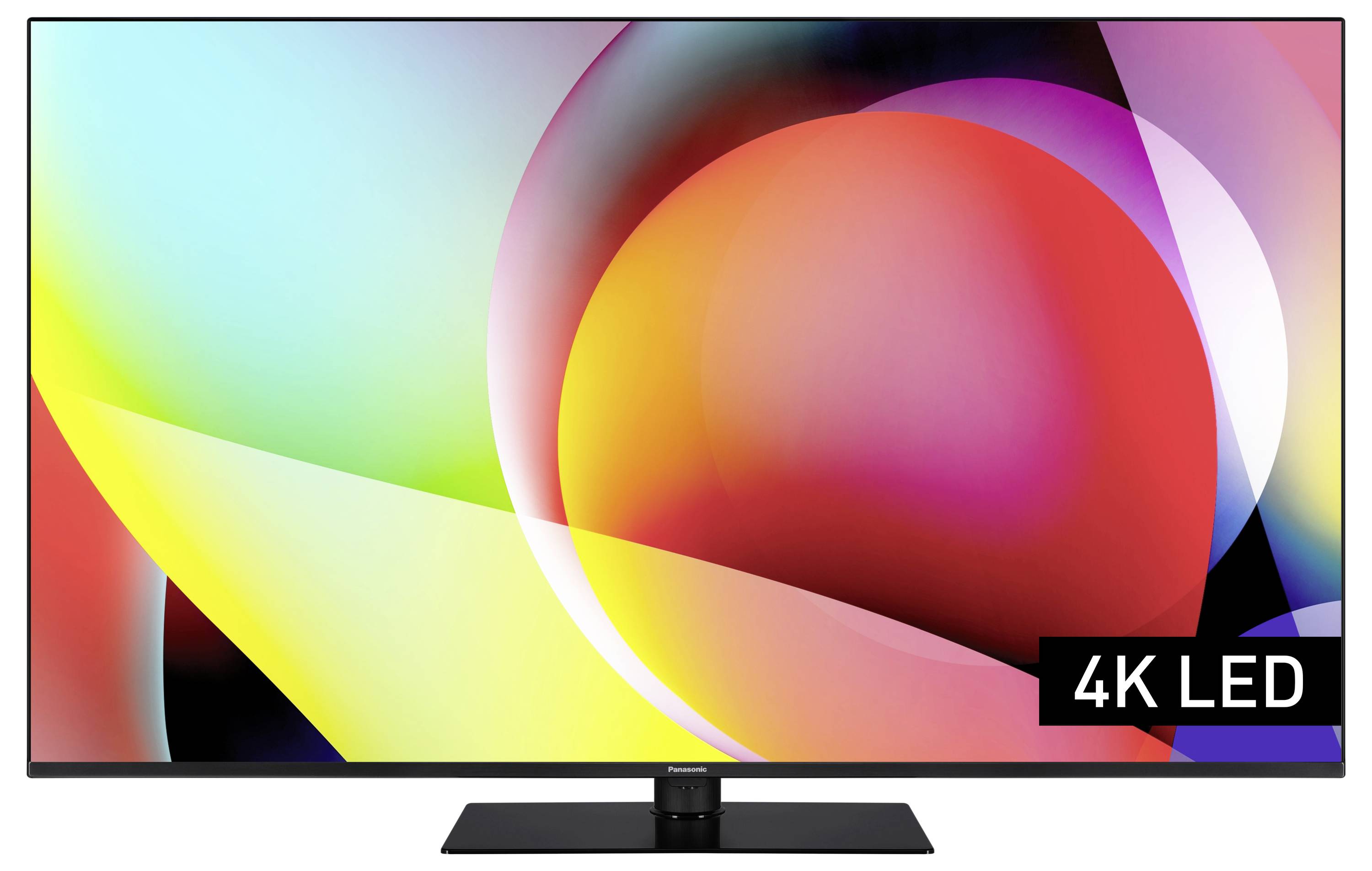 'Farbenfroher TV-Bildschirm mit abstraktem Design, zeigt 4K LED-Modell. Lebendige Kreise und Formen in Rot, Gelb und Lila.'
