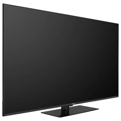 Ein moderner, schwarzer Flachbildfernseher mit großem Bildschirm steht aufrecht.