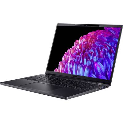 Ein schwarzer Laptop mit geöffnetem Bildschirm zeigt ein farbenfrohes Blumenmotiv auf schwarzem Hintergrund, schräg von vorne gesehen.