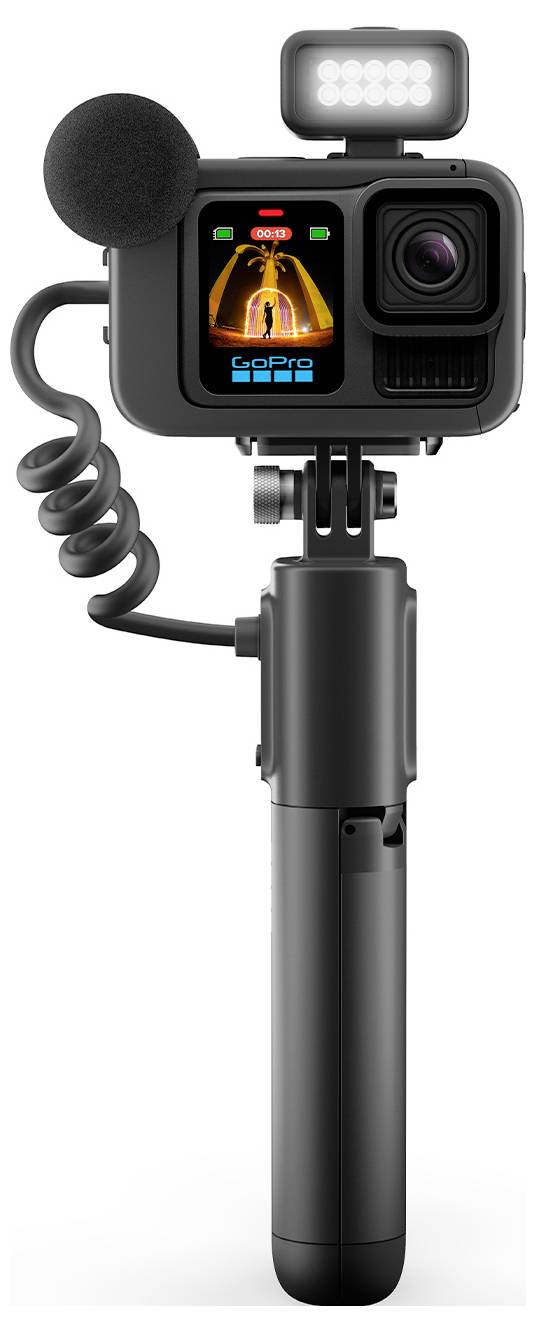 Kompakte Action-Kamera mit Display, Mikrofon, LED-Licht und Griff. Perfekt für Outdoor-Videografie und Vlogs.