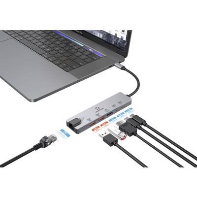Ein Laptop ist mit einem USB-C-Hub verbunden, der zahlreiche Anschlüsse bietet, darunter HDMI, USB-A, Ethernet und Speicherkartenleser.