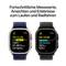 Zwei Smartwatch-Displays zeigen Gesundheitsdaten wie Herzfrequenz (157 BPM) und Streckeninformation (26,2 km/h) beim Laufen und Radfahren.