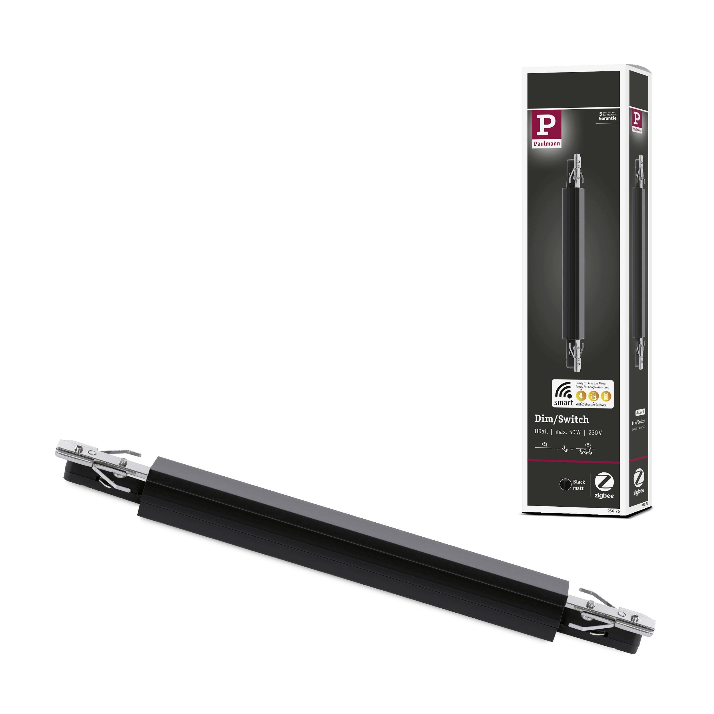 Ein schwarzes elektronisches Gerät mit Kabelverbindungen, daneben eine schwarze Schachtel mit Produktinformationen.