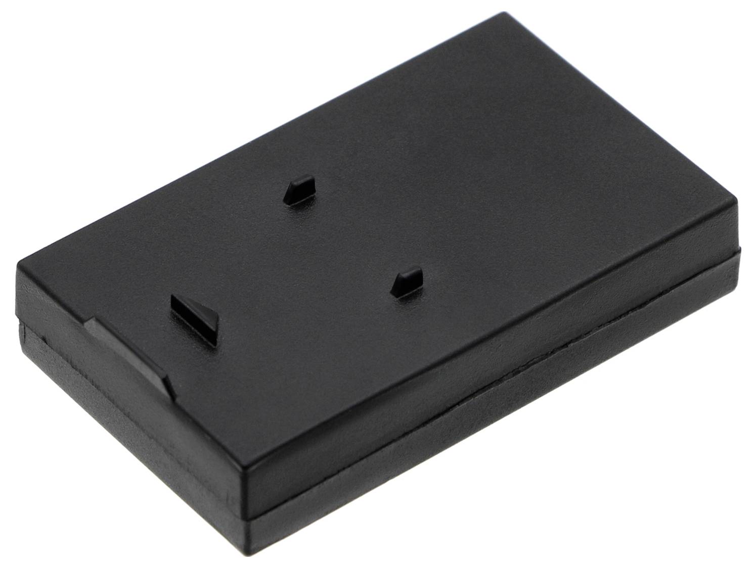 Ein rechteckiges schwarzes Kunststoffgehäuse, vermutlich ein Elektronik-Modul, liegt auf einer flachen Oberfläche.