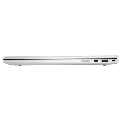 Silberner Laptop von der Seite, geschlossen, mit erkennbaren Anschlüssen und Schlitzen auf der rechten Seite.