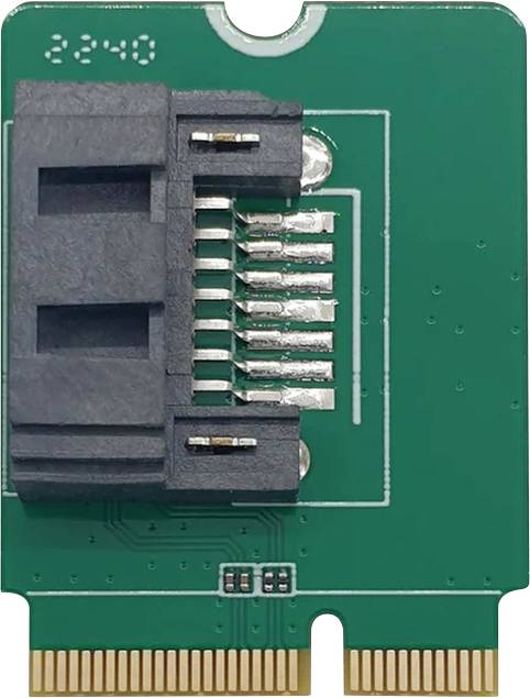 Grüne Leiterplatte mit elektronischen Anschlüssen und Bauteilen, geeignet für Computer-Hardware-Installationen.