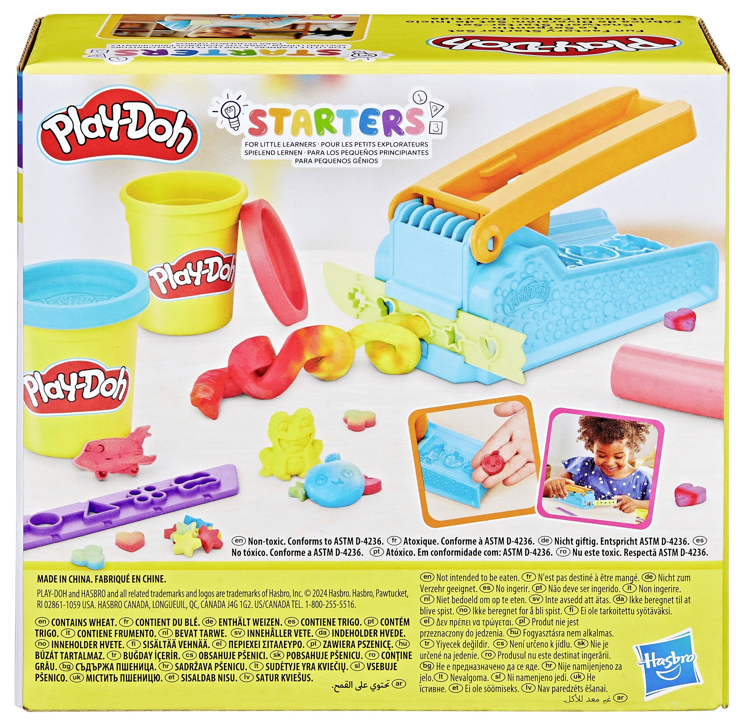 Spielset-Verpackung von Play-Doh mit Knete, Förmchen und Presse. Bild eines Kindes, das mit Knete spielt. Geeignet für kreative Aktivitäten.