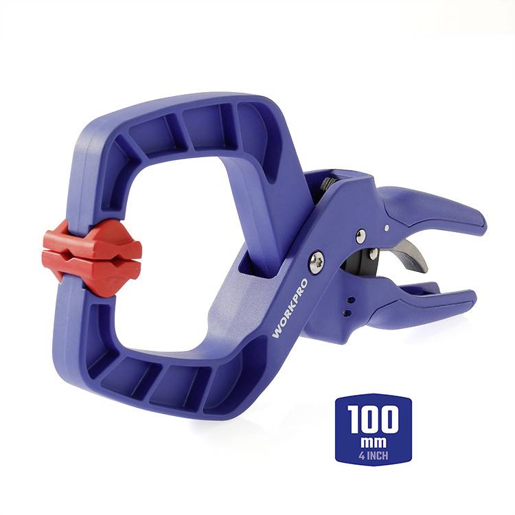 Eine blaue Kunststoffzwinge mit roter Drehschraube, geöffnet auf 100 mm (4 Zoll). Verwendet zum Fixieren von Werkstücken.