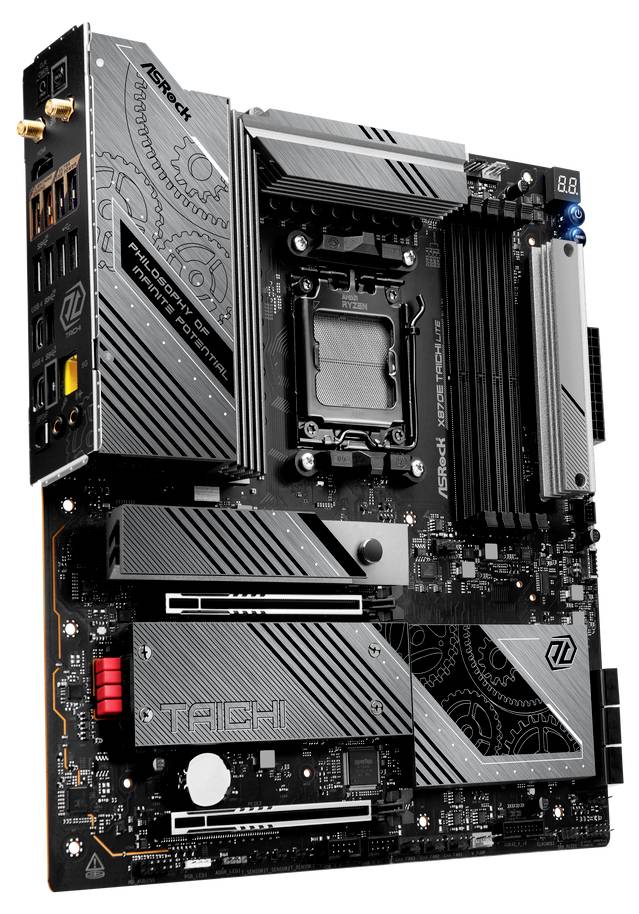 Schwarzes Motherboard mit silbernen Elementen und technischen Details; verschiedene Anschlüsse und Slots für Computerkomponenten sichtbar.