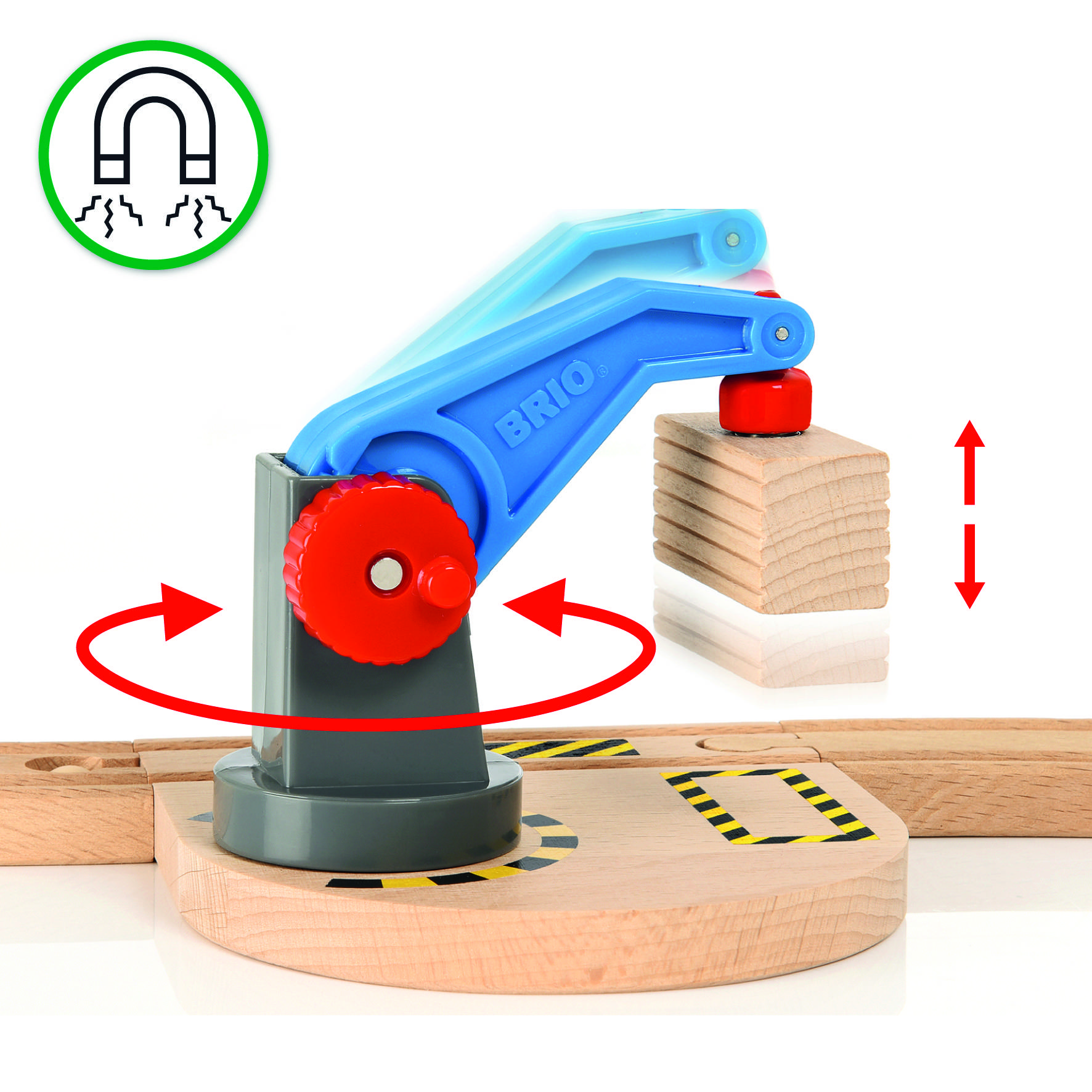 Ein blauer Spielzeugkran mit roten Details hebt einen Holzblock. Ein Pfeil zeigt rotierende Kranbewegung; Magnet-Symbol links oben.