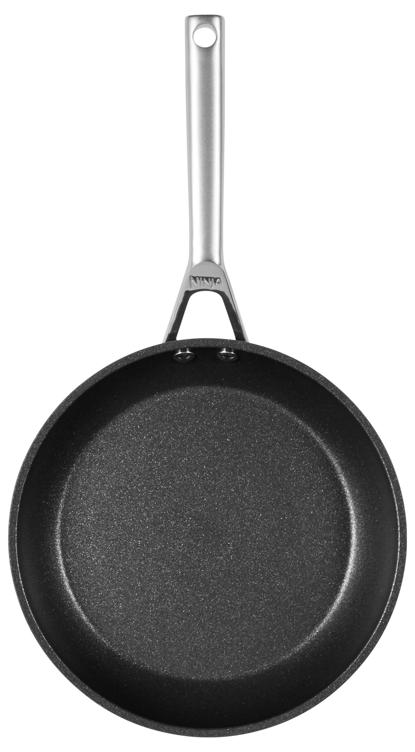 Eine schwarze Bratpfanne mit silbernem Griff, Ansicht von oben. Ideal für Kochaktivitäten und Essenszubereitung.