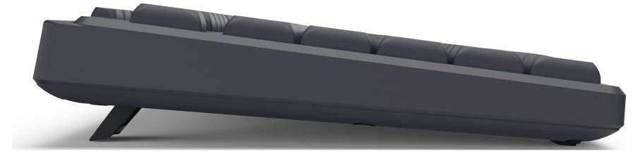 Seitliche Ansicht einer flach geneigten schwarzen Computertastatur mit erhöhten hinteren Tastenreihen.