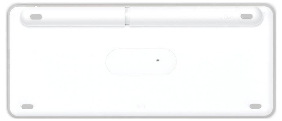 Weiße elektronische Tastatur von unten, abgebildet ohne erkennbare Tasten. Sichtbare Scharniere und Gummifüße an den Ecken.