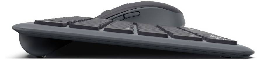 Eine seitliche Ansicht einer modernen, ergonomisch gestalteten Tastatur und Maus mit einem geschwungenen Design zur Handgelenksentlastung.