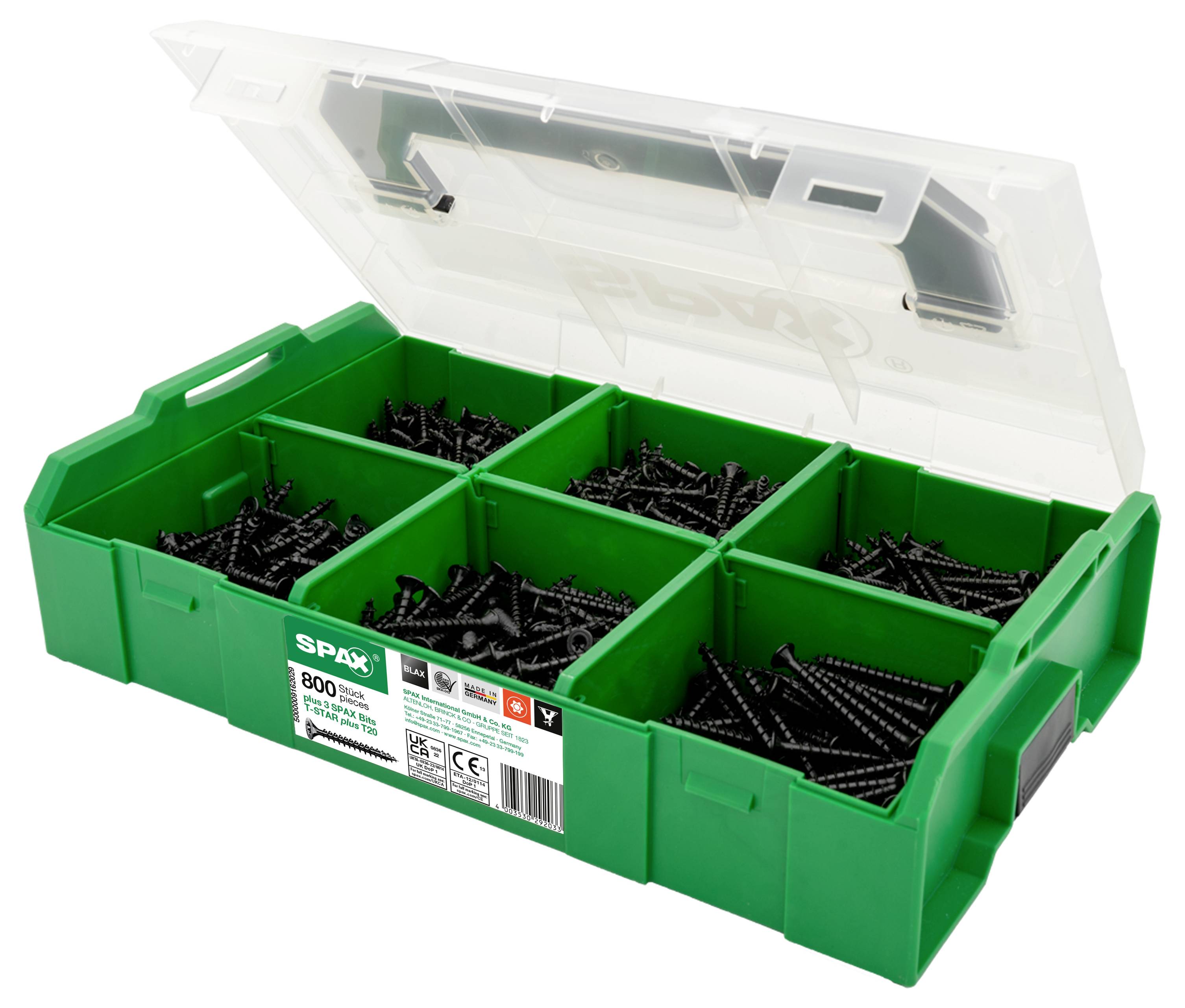 Grüne Sortimentsbox mit sechs Fächern, gefüllt mit schwarzen Schrauben. Der Deckel ist transparent und leicht geöffnet.