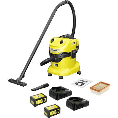 Gelber Industriestaubsauger mit Zubehör: zwei Akkus, zwei Ladegeräte, Filter, und Beutel, bereit für Reinigungsarbeiten.