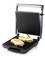 Ein offener Kontaktgrill mit zwei gegrillten Panini. Die Panini enthalten Schinken, Käse und Salat. Ideal für Sandwiches und Panini.