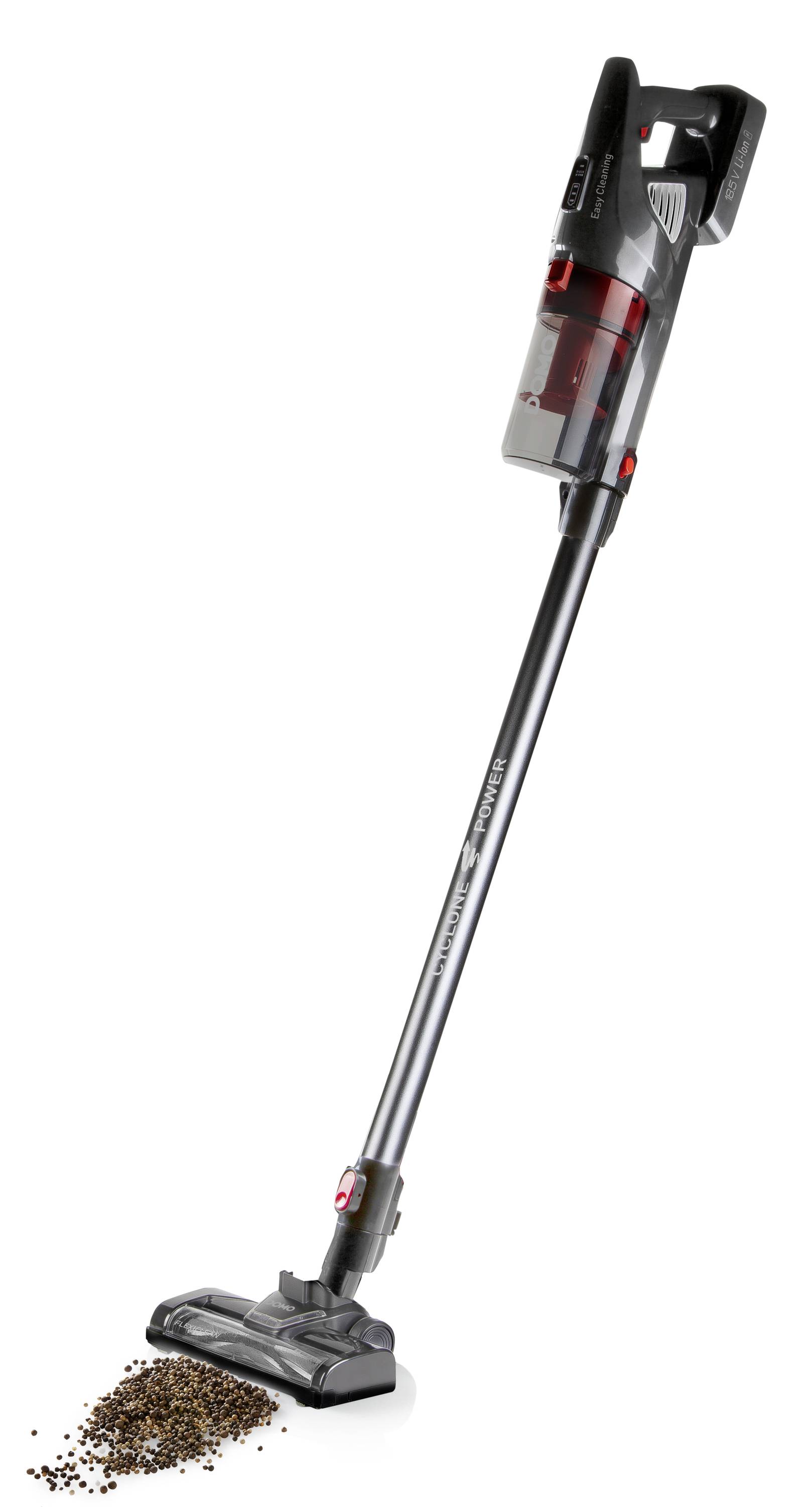 Stabstaubsauger saugt Kaffeebohnen vom Boden. Elektronisches Gerät zur schnellen und effizienten Reinigung.