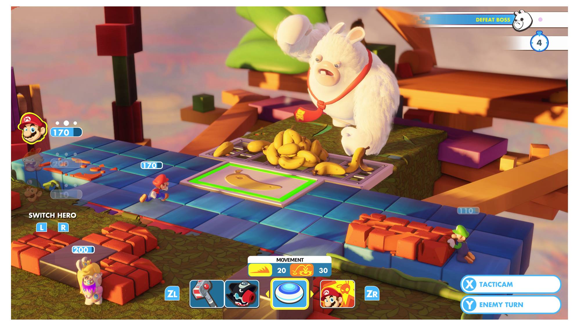 Ein Bildschirmfoto aus einem Videospiel zeigt animierte Charaktere, die sich auf einem Schachbrett-artigen Spielfeld bewegen. Ein großer weißer Hase sitzt oben mit Bananen.