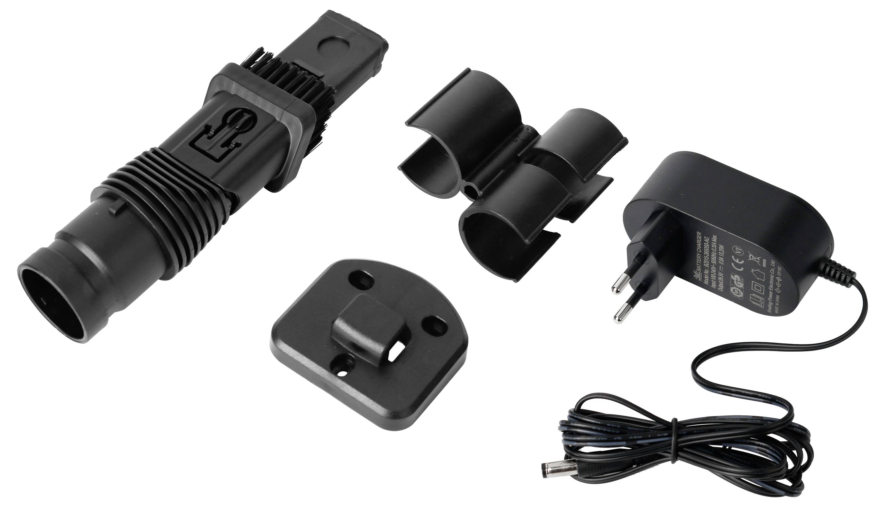 Ein Ladegerät mit Netzteil, Adapter und Halterungen für die Verbindung eines elektronischen Geräts.