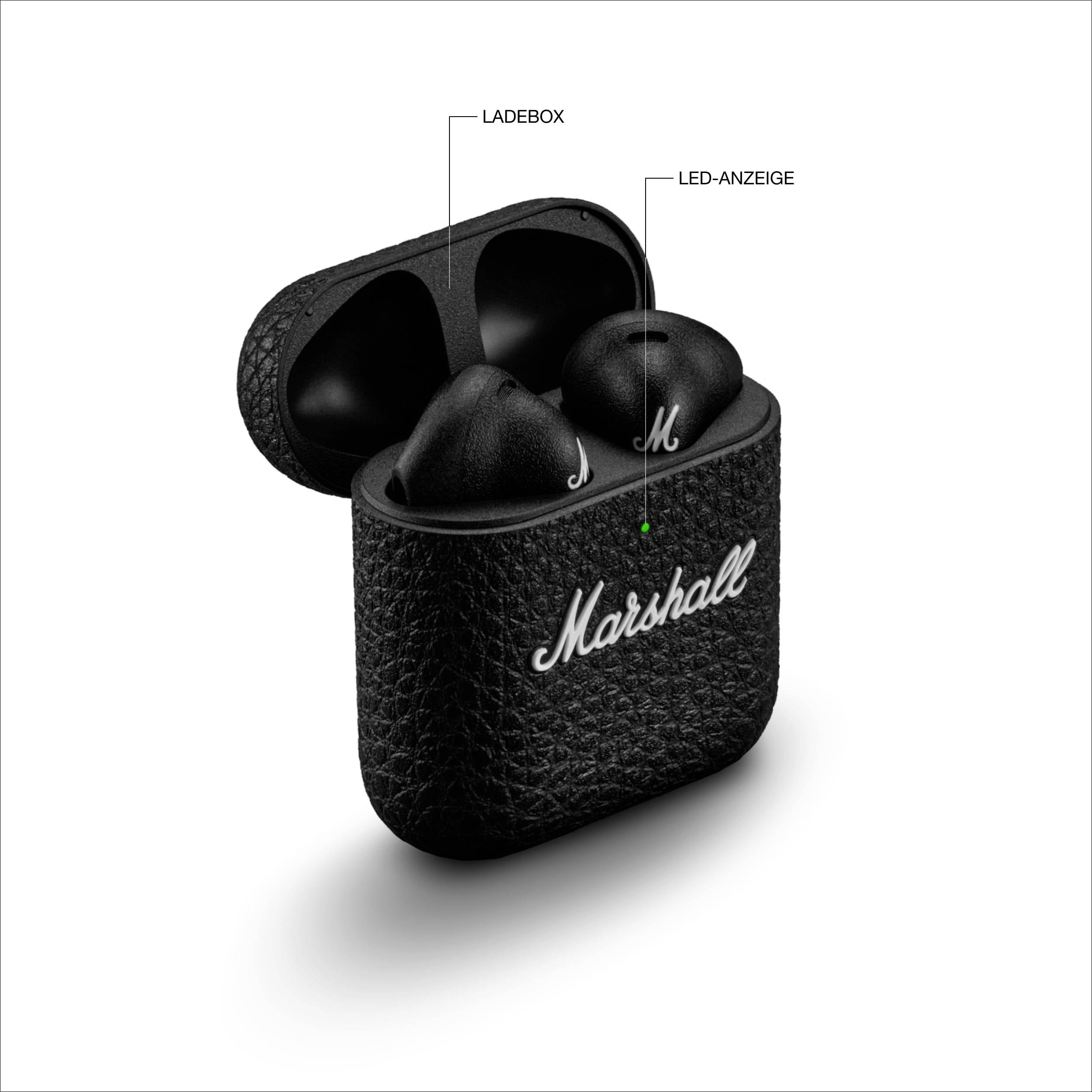 Schwarze kabellose In-Ear-Kopfhörer in einer Ladebox mit LED-Anzeige; das Wort 'Marshall' steht auf der Box.