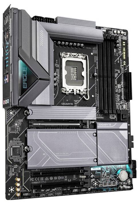 Das Bild zeigt ein Computer-Mainboard mit einem Intel-Prozessorsockel in der Mitte, mehreren RAM-Steckplätzen und Erweiterungssteckplätzen.