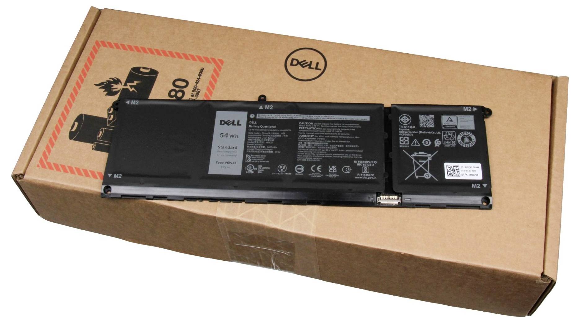 Akku einer Dell-Laptopbatterie mit 54 Wh, auf einem Karton liegend. Die Batterie ist schwarz und zeigt verschiedene Sicherheits- und Produktinformationen.