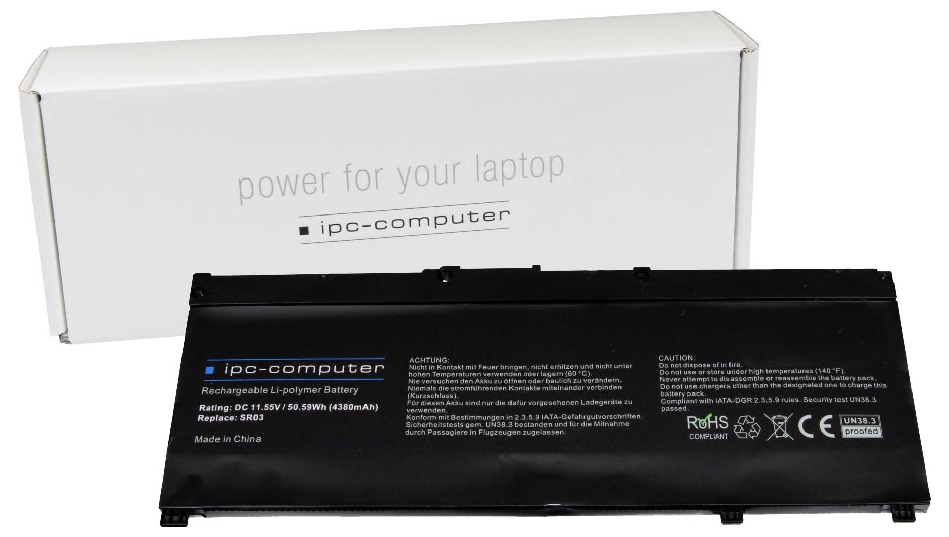 Ein schwarzer Laptop-Akku von 'ipc-computer' liegt vor einer weißen Verpackung mit der Aufschrift 'power for your laptop'.