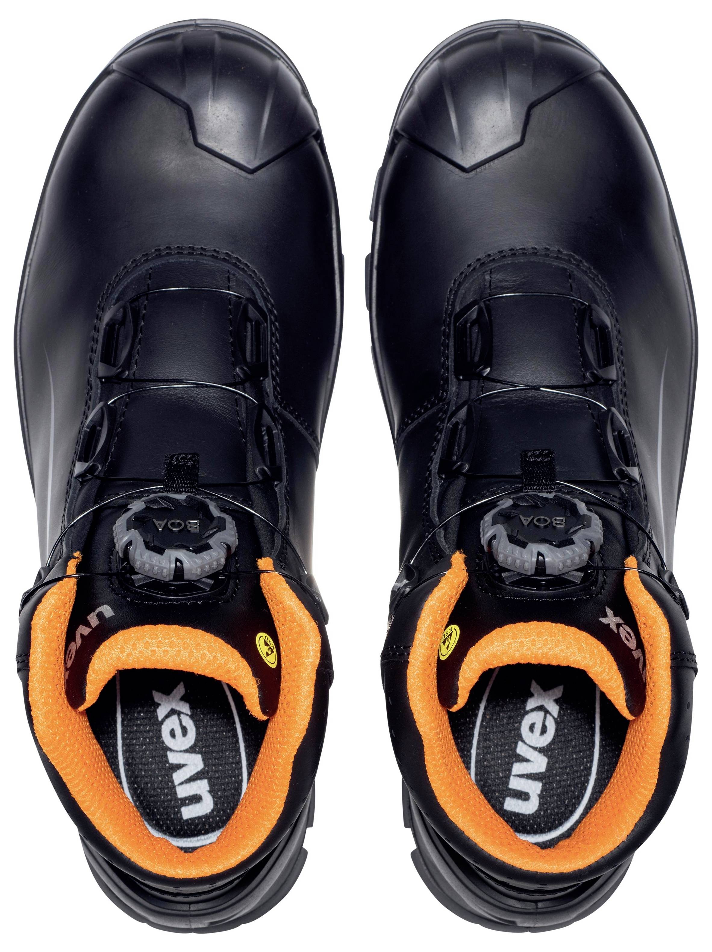 Schwarze Sicherheitsschuhe mit orangenen Innenfuttern und Verschlusssystem.
