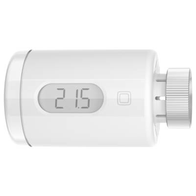 Ein weißes, zylindrisches Thermostatventil mit digitaler Anzeige zeigt '21,5'. Rechts ein silberner Drehregler.