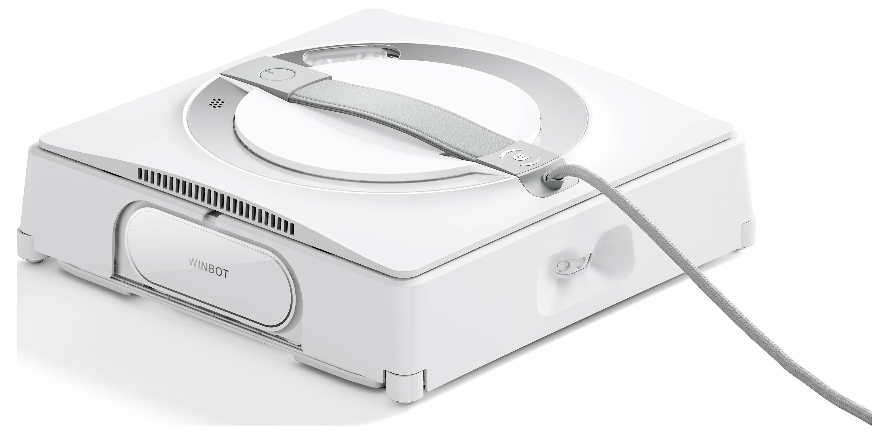 Ein weißer, quadratischer Robotergerät mit Kabel, vermutlich ein Fensterreinigungsroboter, auf einer hellen Oberfläche liegend.