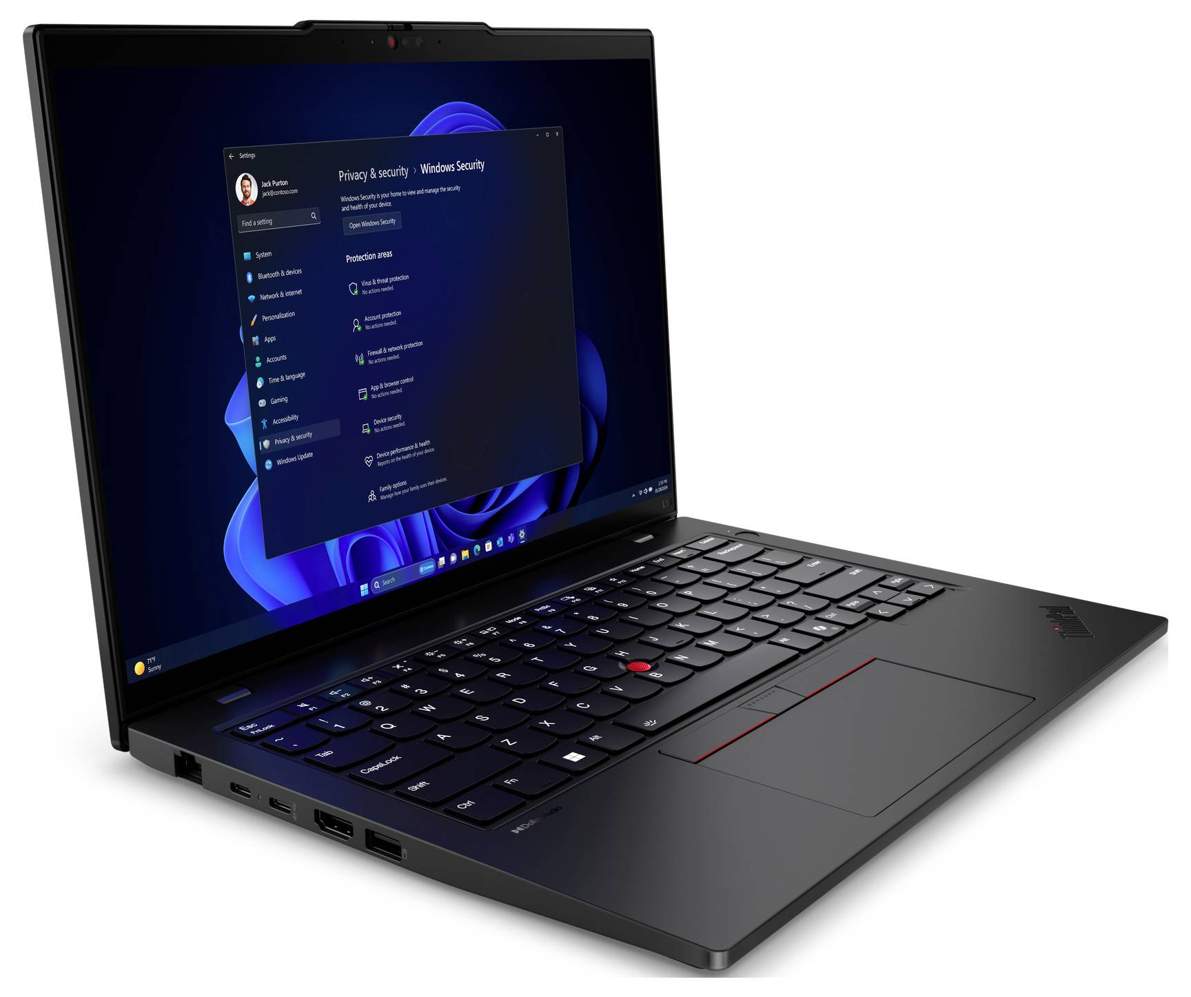 Ein schwarzer Laptop mit Windows-Betriebssystem zeigt das Fenster 'Windows-Sicherheit', das Datenschutz- und Sicherheitsoptionen anzeigt.