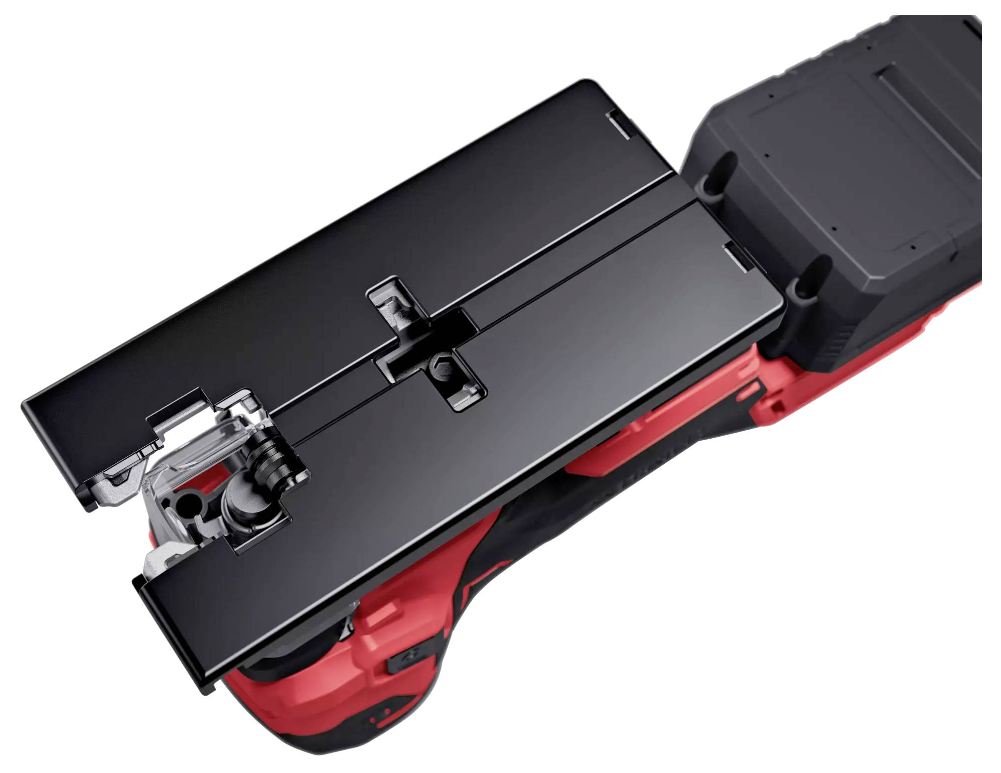 Elektrische Schneidemaschine mit schwarzem Schneidgerät und rotem Griff, Ansicht von oben.