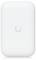 Ein weißes, rechteckiges Gerät mit abgerundeten Ecken und einem kleinen blauen Licht an der Unterseite. Das Logo 'U' ist in der Mitte.