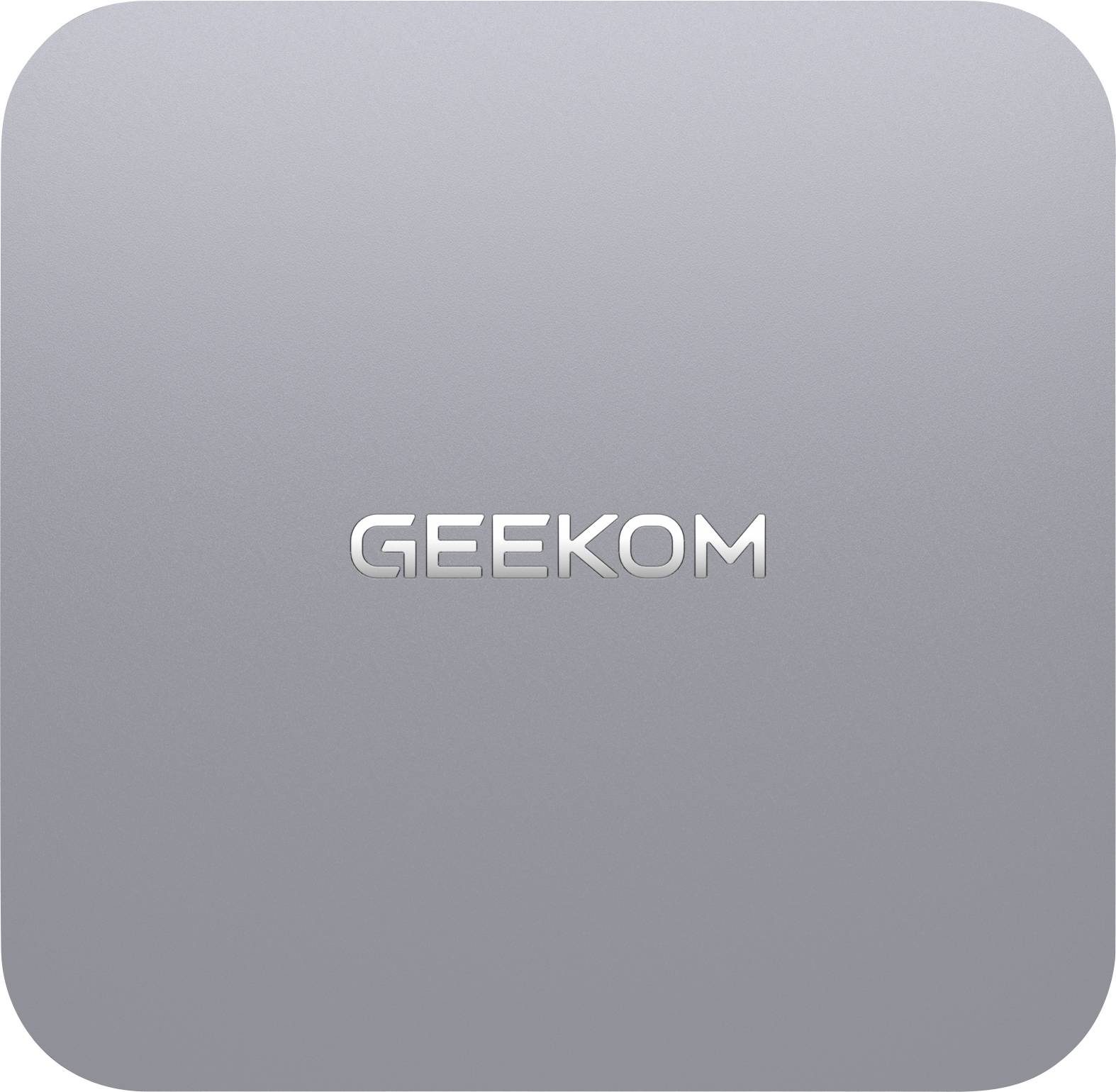 Ein silbernes Gehäuse mit dem Schriftzug 'GEEKOM' in der Mitte.