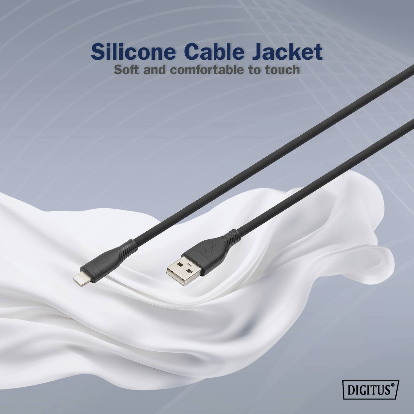Das Bild zeigt ein USB-Kabel auf einem weißen Tuch mit der Aufschrift 'Silicone Cable Jacket - Soft and comfortable to touch'.