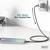 Ein Smartphone wird über ein Kabel an eine Steckdose angeschlossen, zeigt einen Ladezustand an. Beschriftung: '60 W Max. Charging Power'.