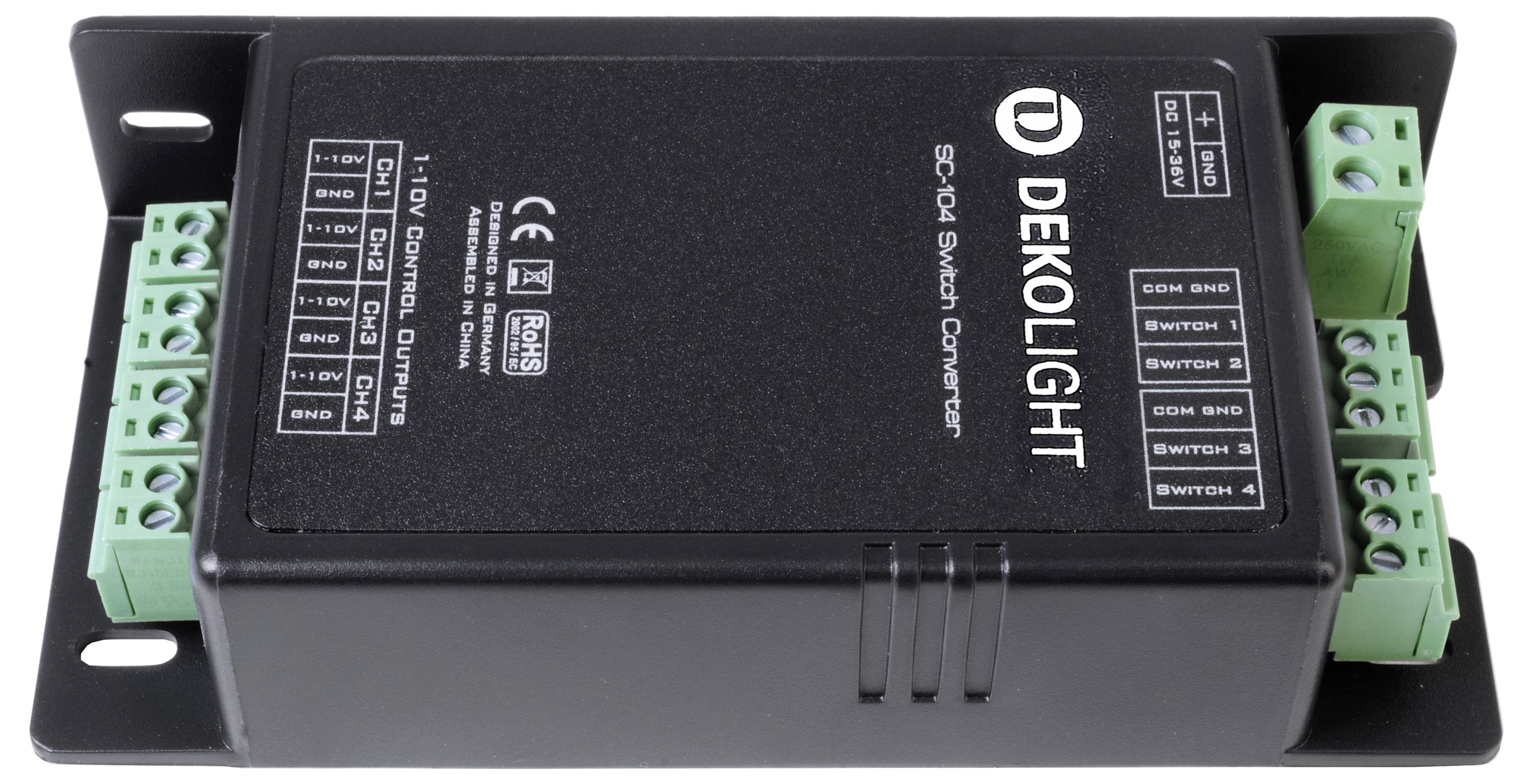 Schwarzer DEKOLIGHT Schalteinlager mit grünen Anschlüssen, Modell SP-104, für Beleuchtungssteuerung, zeigt Bedienelemente und technische Details.