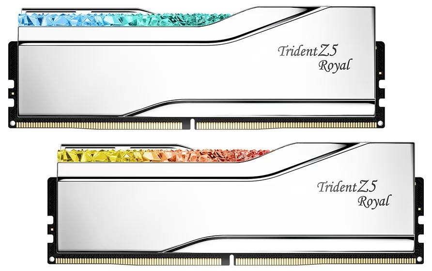 Zwei silberne RAM-Module der Marke 'Trident Z5 Royal' mit dekorativen farbigen Elementen oben: eines in Türkis, das andere in Orange.