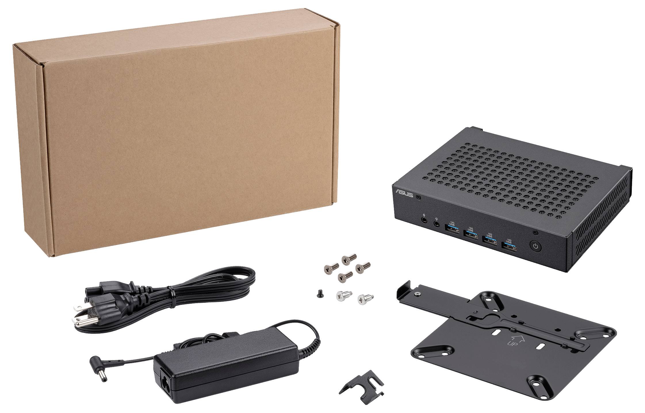 Mini-PC mit Zubehör: Netzteil, Kabel, Montageset und braune Verpackung. Das Gerät hat Lüftungsschlitze und USB-Anschlüsse.