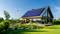 Ein modernes Haus mit Solarpanelen auf dem Dach, umgeben von einem gepflegten Garten. Im Hintergrund steht eine kleine Windturbine.
