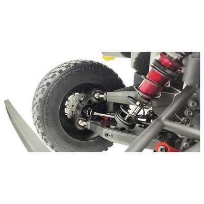 Nahaufnahme eines Offroadfahrzeug-Federungssystems mit sichtbarem Stoßdämpfer und Radaufhängung – Detailansicht mechanischer Teile.