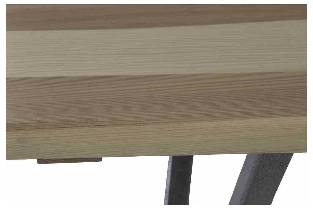 Eine Nahaufnahme eines hölzernen Tischbeins mit einer glatten Oberfläche und Metallrahmen.