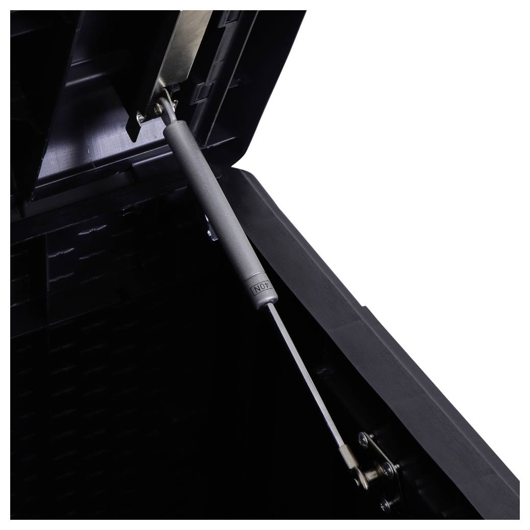 Gasdruckfeder, die den Deckel eines schwarzen, rechteckigen Behälters stützt. Sie enthält die Aufschrift 'not'.