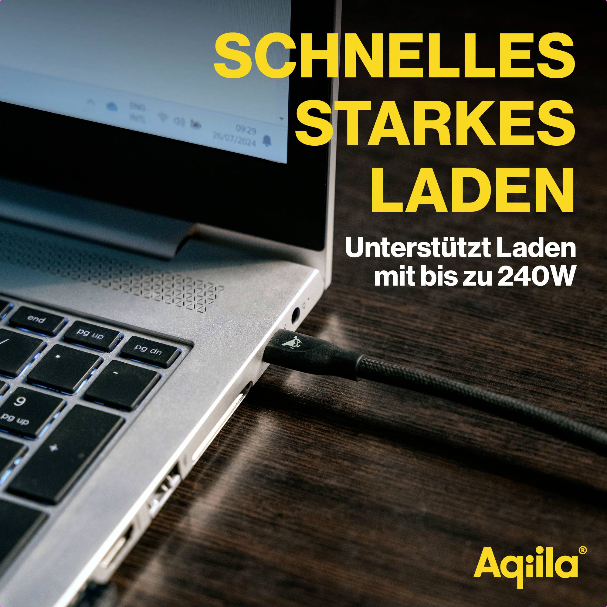 Laptop wird mit einem Kabel aufgeladen. Text auf Bild: 'Schnelles starkes Laden. Unterstützt Laden mit bis zu 240W'.