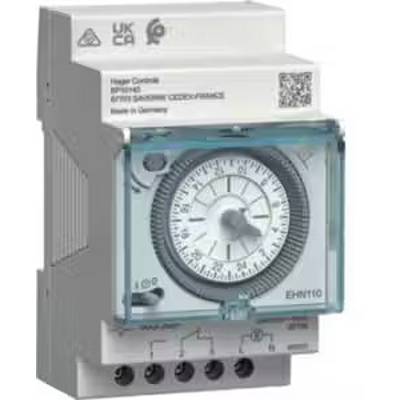 Ein silbernes und transparentes Elektronikgerät mit einer analogen Uhranzeige in der Mitte und mehreren Anschlüssen am unteren Rand.