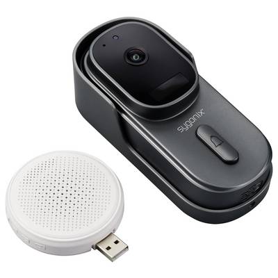 'Alarmsystem mit Kamera und Lautsprecher. Kamera ist schwarz und rechteckig, Lautsprecher rund und weiß mit USB-Anschluss.'