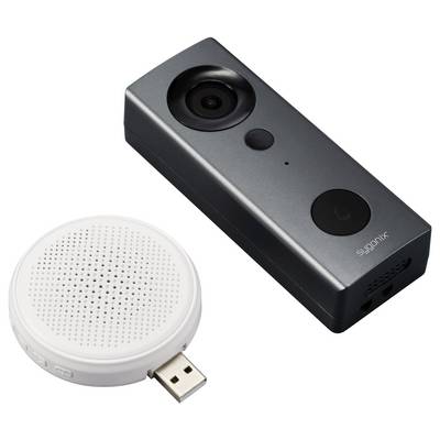 Ein rechteckiges, schwarzes Kameragerät und ein rundes, weißes USB-Lautsprechermodul, geeignet für Überwachungszwecke.