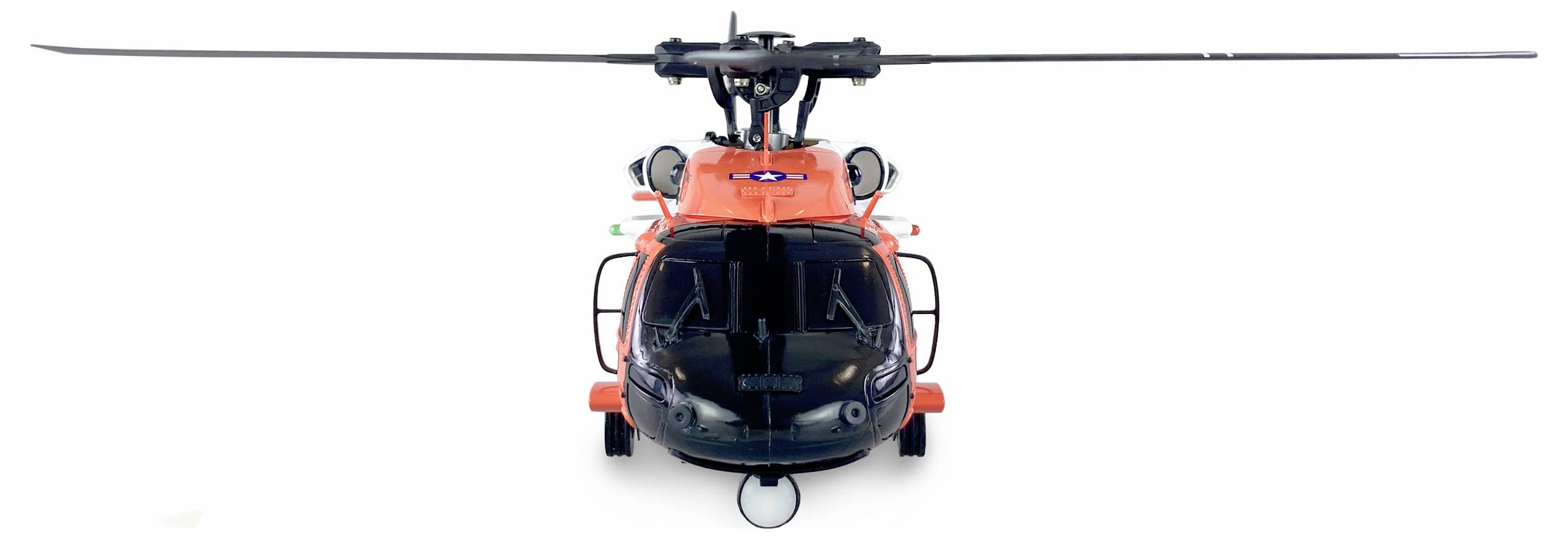 Ein orangefarbener Rettungshubschrauber mit sichtbaren Rotorblättern und Suchscheinwerfer, frontal fotografiert.