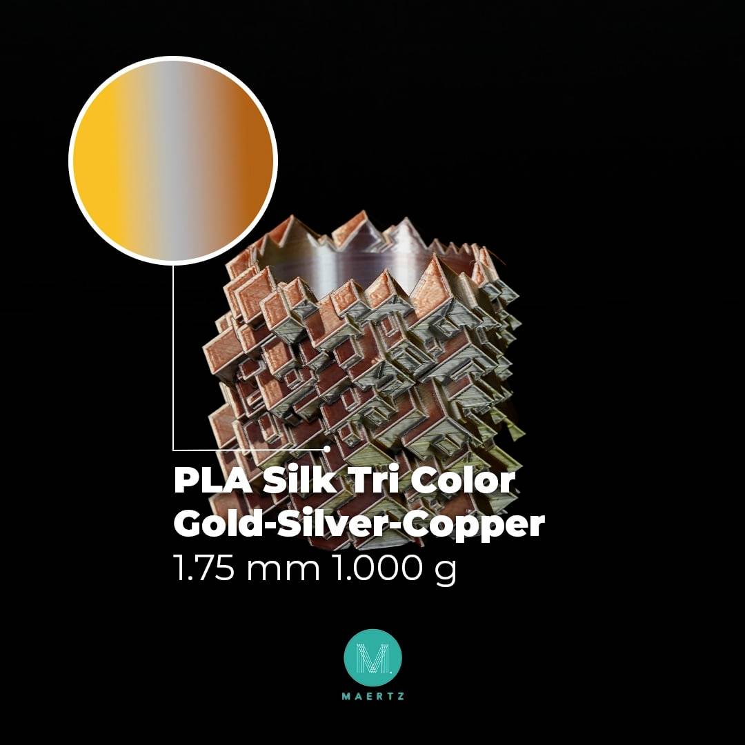 'PLA Silk Tri Color Gold-Silver-Copper, 1.75 mm 1000 g' Text über einem Würfelobjekt mit gold-silber-kupferfarbenen Schichten.